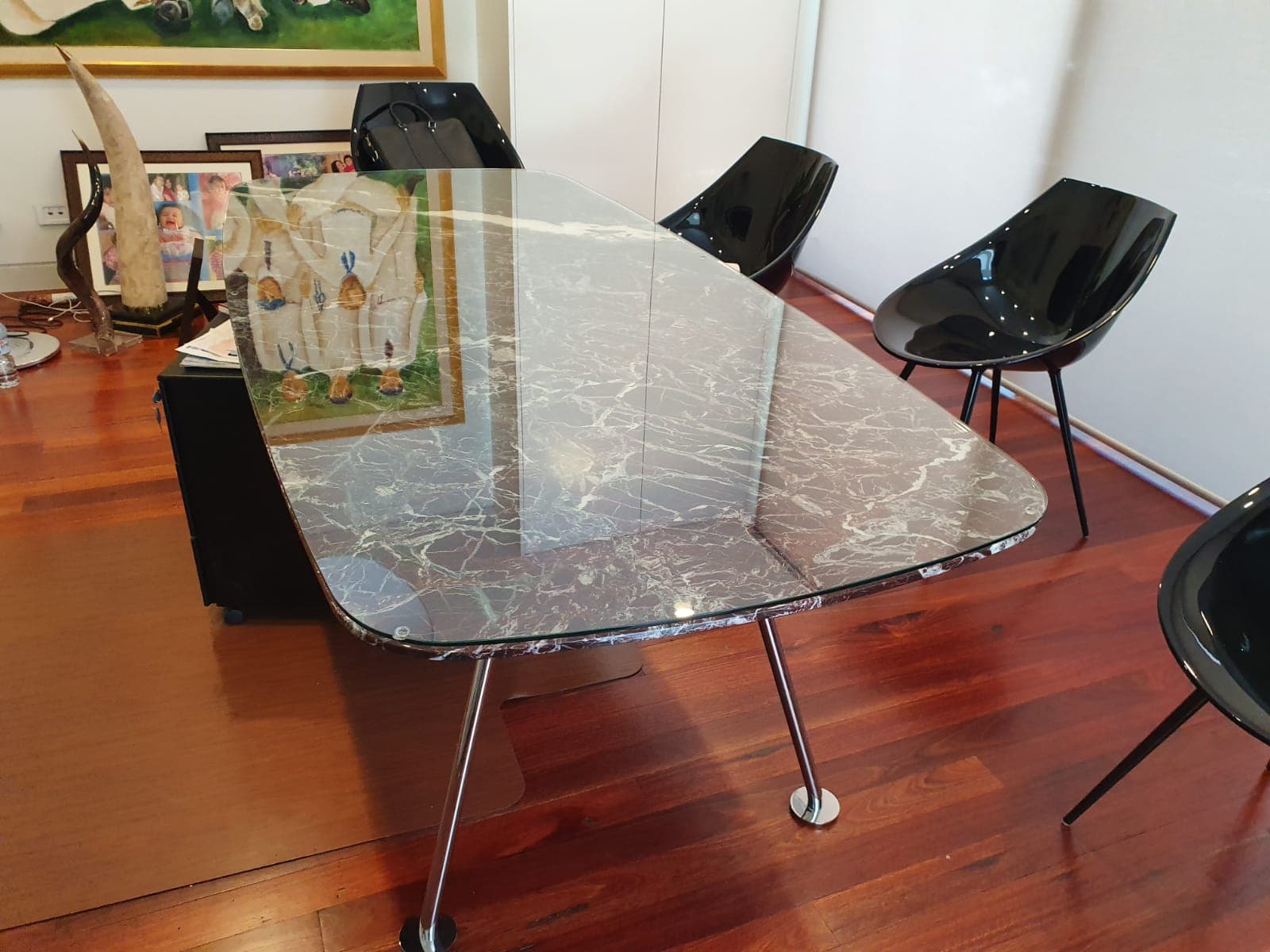 Custom glass tabletop installed on modern office desk with clear tempered glass finish
